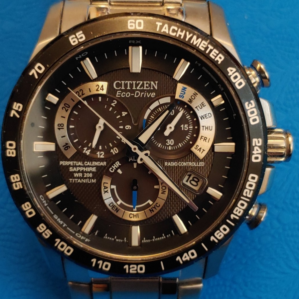 Citizen Men's Atomic Time Eco-Drive Titanium Brace